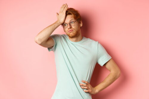 Tired Young Man With Red Hair Wearing Glasses Lo 2026 03 20 00 28 19 Utc 1