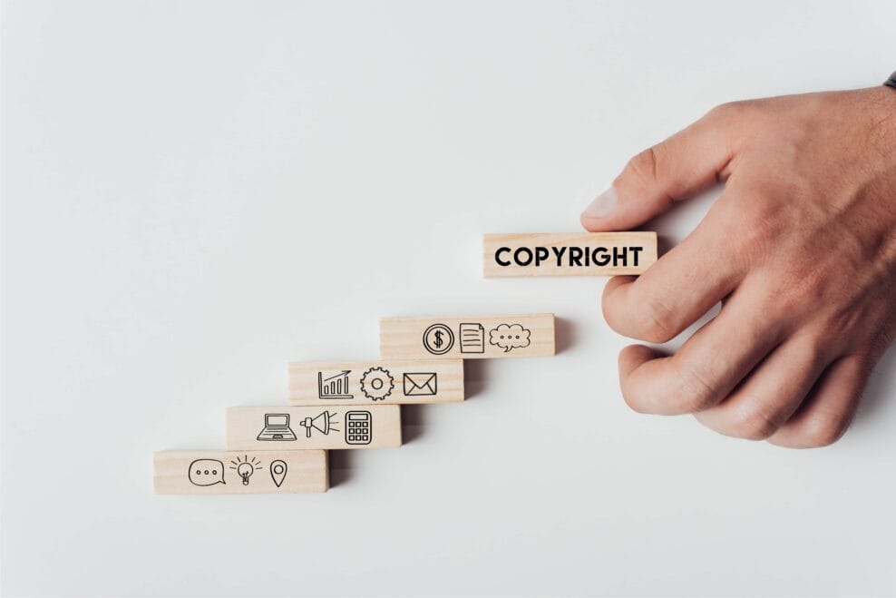 Cropped View Of Man Holding Wooden Block With Word 2026 01 07 05 54 46 Utc